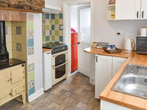 Kuchyň nebo kuchyňský kout v ubytování Dune-Cottage + 16 fotografií