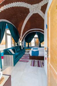 Ένα ή περισσότερα κρεβάτια σε δωμάτιο στο Casa Nile View rooms - Nubian House