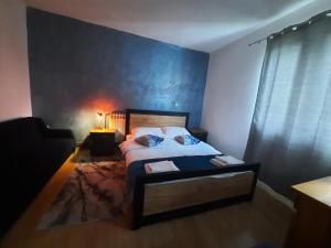 Ένα ή περισσότερα κρεβάτια σε δωμάτιο στο Pansion Silver City