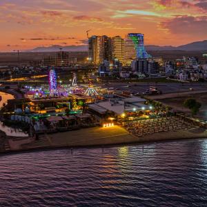 a view of a city at night at Grand Sapphire Hotel, Casino & Spa Holiday Deluxe Residential Home in Iskele