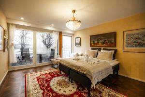 Ένα ή περισσότερα κρεβάτια σε δωμάτιο στο Arctic Winter Villa - Pool and Sauna +39 φωτογραφίες