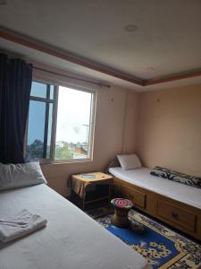 Postel nebo postele na pokoji v ubytování Sunrise View Homestay + 43 fotografií