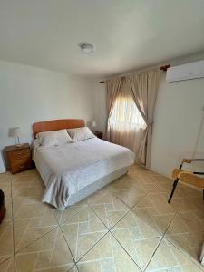 Ένα ή περισσότερα κρεβάτια σε δωμάτιο στο Hualcapo Mistico Getaway +20 φωτογραφίες