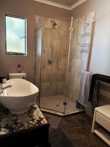 Ένα μπάνιο στο Gigi Lifestyle Cottage