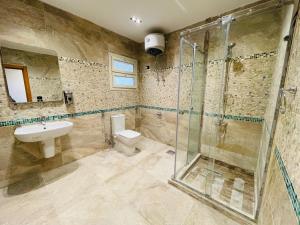 Ένα μπάνιο στο فندق ديزرت روز -Desert Rose Hotel