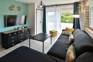 Et tv og/eller underholdning på Ty Kastine - Charmante maison pour 10