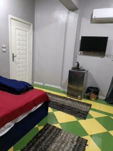 A television and/or entertainment centre at NEW Hostel pyramids