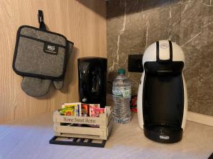 Příslušenství pro přípravu čaje a kávy v ubytování Casa Simona