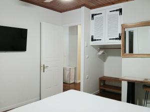 Hellenes house tesisinde bir televizyon ve/veya eğlence merkezi