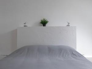 Ένα ή περισσότερα κρεβάτια σε δωμάτιο στο Appartement moderne - Reims Centre