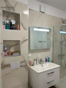 Koupelna v ubytování Mira Mare Apartments + 4 fotografie