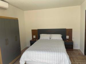 Postel nebo postele na pokoji v ubytování Colinas House