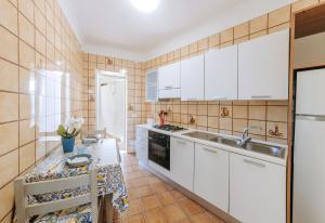 Kuchyň nebo kuchyňský kout v ubytování Lucia Maison