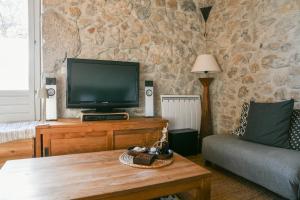 TV a/nebo společenská místnost v ubytování Casa Mialy - Clim Wifi Terrasse