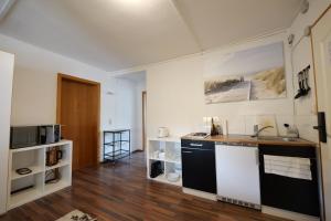 Kuchyň nebo kuchyňský kout v ubytování HAVENU Baiersbronn-Mitteltal