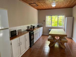 Kuchyň nebo kuchyňský kout v ubytování Little Louisa