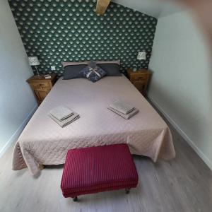 Postel nebo postele na pokoji v ubytování au petit chai