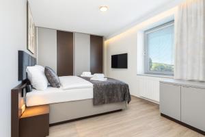 Ένα ή περισσότερα κρεβάτια σε δωμάτιο στο Hotel Awam