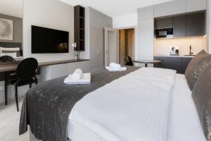 Ένα ή περισσότερα κρεβάτια σε δωμάτιο στο Hotel Awam