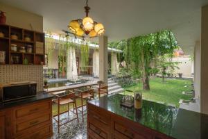 Bazén v ubytování Vila Pribadi dekat Prambanan-Griya Bayan Kraguman nebo v jeho okolí