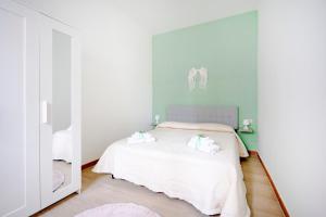 Ένα ή περισσότερα κρεβάτια σε δωμάτιο στο Miro’ House