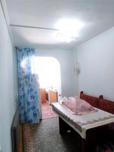 Postel nebo postele na pokoji v ubytování InManas