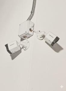 a pair of wii controllers hanging on a wall at النبلا الماسي in Al Madinah