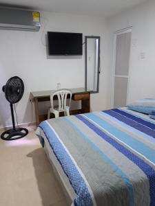 Postel nebo postele na pokoji v ubytování Arriendo habitaciones amobladas con aire acondicionado