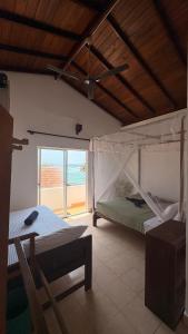 Postel nebo postele na pokoji v ubytování Sabine Holiday Resort and Restaurant