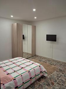 Postel nebo postele na pokoji v ubytování La casa di Nerone