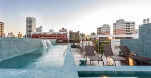 Bazén v ubytování 2 quartos com varanda em Manaíra AH206 nebo v jeho okolí