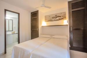 Ένα ή περισσότερα κρεβάτια σε δωμάτιο στο Apartamento en club cala azul