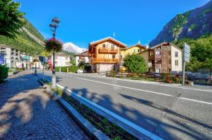 Nespecifikovaný výhled na hory nebo výhled na hory při pohledu z apartmánu + 6 fotografií