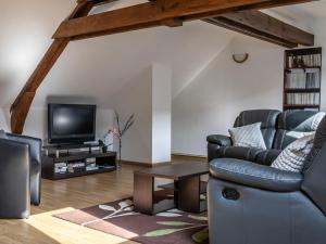 TV a/nebo společenská místnost v ubytování Maison de campagne au cœur des vignes