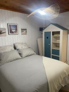 Postel nebo postele na pokoji v ubytování Le Lodge BelAir