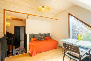 Ένα ή περισσότερα κρεβάτια σε δωμάτιο στο La Passerelle - Entre Vannes & Auray