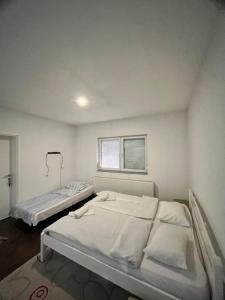 Voodi või voodid majutusasutuse Velvet Suites toas