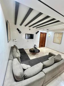 Posezení v ubytování Le repos parfait + 2 fotografie