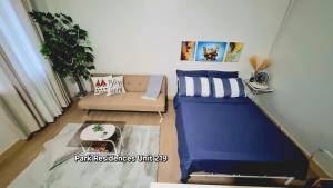 PARK RESIDENCE Unit 219, SM City Santa Rosa, Laguna, by SMDCにあるベッド +10枚の写真