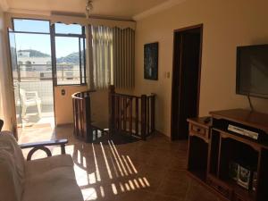 Et tv og/eller underholdning på Ed Verdes Mares Prainha Arraial