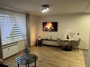 TV a/nebo společenská místnost v ubytování Studio w centrum