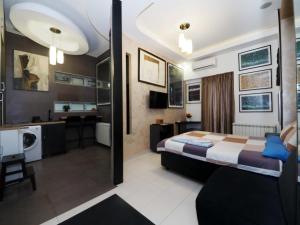 Ένα ή περισσότερα κρεβάτια σε δωμάτιο στο KennedyLux Apartment