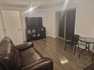 Χώρος καθιστικού στο A spacious double room in a peaceful area