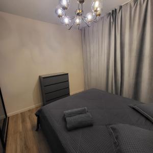 Ένα ή περισσότερα κρεβάτια σε δωμάτιο στο Квартира в современном стиле!