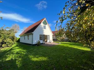 Κήπος έξω από το Vakantiewoning Westhoek