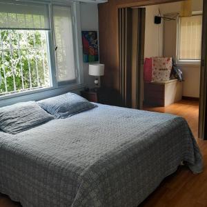 Postel nebo postele na pokoji v ubytování Casa Boulevard 100