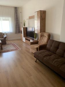 Χώρος καθιστικού στο Cozy house with garden and bbq near Vienna