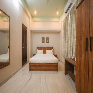 Postel nebo postele na pokoji v ubytování The Nivas