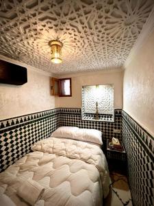 Postel nebo postele na pokoji v ubytování Artisanal Cozy studio médina