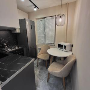 Η κουζίνα ή μικρή κουζίνα στο Квартира в современном стиле!